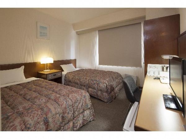Osaka City Hotel Kyobashi Rum bild