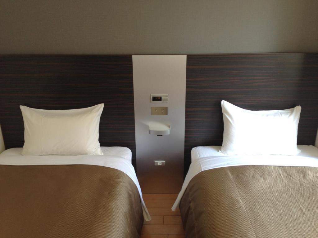 Osaka City Hotel Kyobashi Rum bild