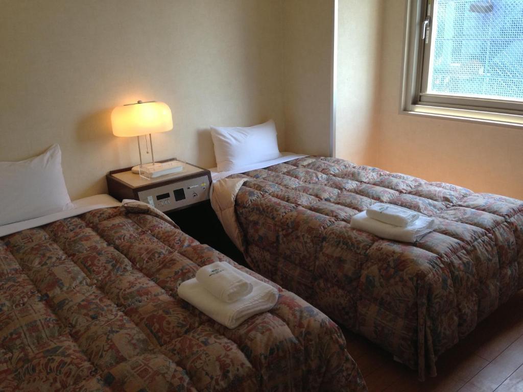 Osaka City Hotel Kyobashi Rum bild