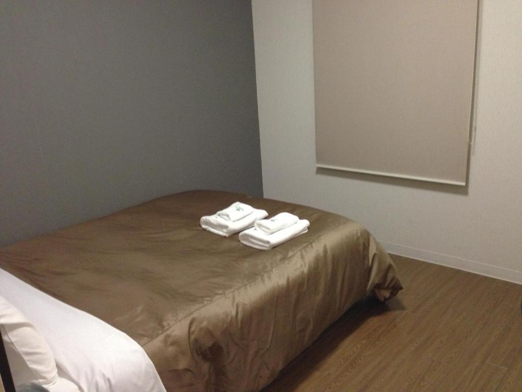Osaka City Hotel Kyobashi Rum bild