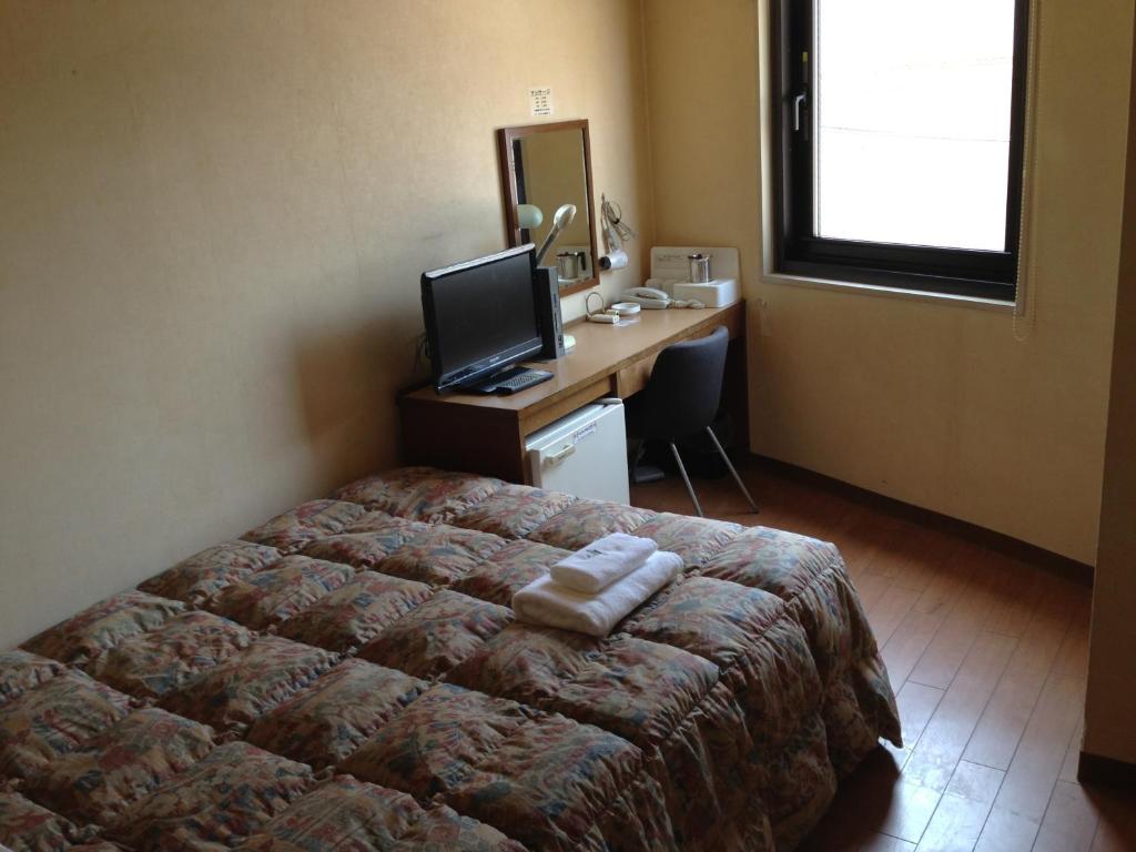 Osaka City Hotel Kyobashi Rum bild